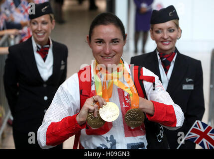 Great Britain's Sarah Storey shows off her medals as she arrives back at Heathrow Airport, London. PRESS ASSOCIATION Photo. Picture date: Tuesday September 20, 2016. The Paralympics GB squad arrive back in the UK after collecting 147 medals to finish second in the 2016 Rio Paralympic medal table, surpassing their total of 120 from London 2012. PRESS ASSOCIATION Photo. Photo credit should read: Steve Parsons/PA Wire Stock Photo