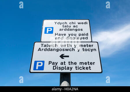 Pay and Display parking sign in English and Welsh language. Stock Photo