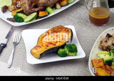 Fried zucchini soup for roasted chicken on white plate Stock Photo