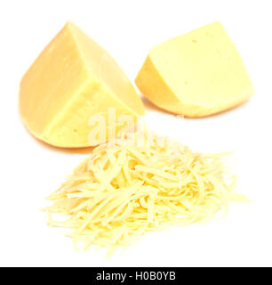 two pieces and pile of grated cheese isolated on white background Stock Photo