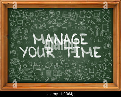 Hand Drawn Manage Your Time on Green Chalkboard. Stock Photo