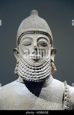 Limestone male figure. Cypriot, Archaic. Last quarter of the 6th century BC. Temple at Golgoi. Detail head. Stock Photo