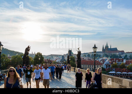 Charles Bridge in  late afternoon, looking towards Prague Castle and spires of St Vitus Cathedral, Prague, Czech Republic Stock Photo