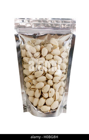 Pistachios are roasted no peeled in packaging foil zip lock bag. Isolated on white with clipping paths. Stock Photo