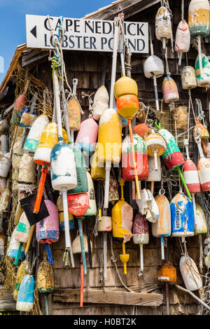 Old Lobster Buoys hanging at Cape Neddick Lobster Pound, York, Maine Stock Photo