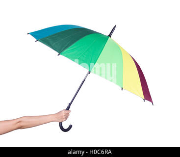 hand holding multicolored umbrella isolated on white background Stock Photo