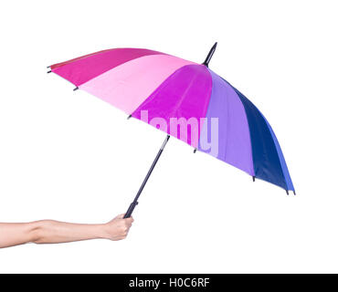 hand holding multicolored umbrella isolated on white background Stock Photo
