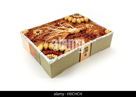 Traditional Korean snack made of a mixture of jujube, chestnuts, pine nuts or Short sangtteok Yakbap also called Stock Photo