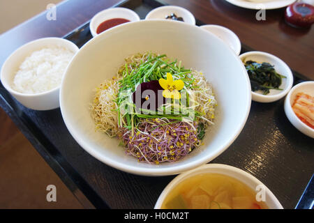 korean says sprout called bibimbap with rice on wooden tray Stock Photo