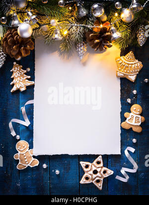 Christmas frame with blue balls and fir evergreen branches on white ...