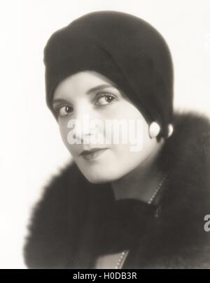 Portrait of woman in cloche hat Stock Photo