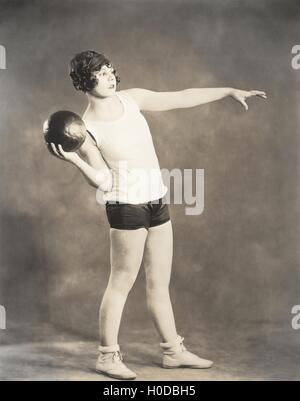 Woman working out with medicine ball Stock Photo