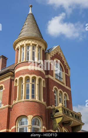 Old building with tower and balcony in Bielefeld, Germany Stock Photo
