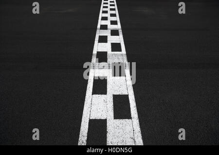Start and Finish motor race line asphalt on Monaco Montecarlo Grand Prix street circuit Stock Photo