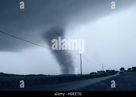 amazing tornado on the roadside in countryside Stock Photo