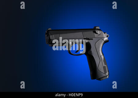 9mm army automatic background black blue clean close-up closeup fire gun guns handgun isolated metal modern new nobody one pisto Stock Photo