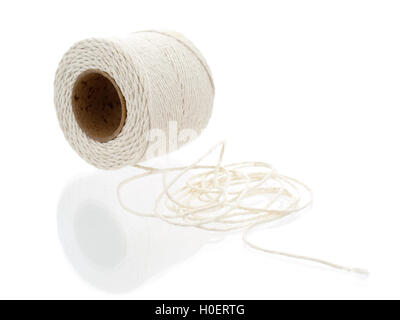 Roll of hemp string isolated on white Stock Photo