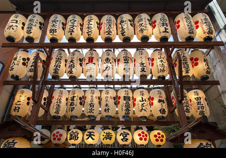 KYOTO, JAPAN - JUNE 4 : Illuminated paper lanterns hanging above the entrance of Nishiki Tenmangu Shrine in Kyoto, Japan on 4th Stock Photo