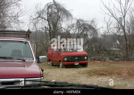 Old cars abandoned in yard Stock Photo