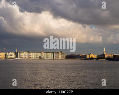 Postcard view on the hermitage winter palace in Saint-Petersburg over Neva river under overcast cloudy sky Stock Photo