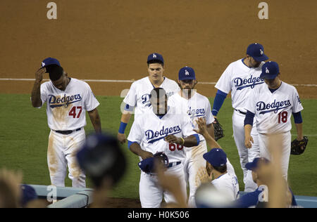 Los Angeles Dodgers', from left, Rafael Furcal, Takashi Saito, of Japan,  J.D. Drew, Wilson Betemit and Julio Lugo celebrate their 4-2 victory  against the Colorado Rockies in a baseball game in Los