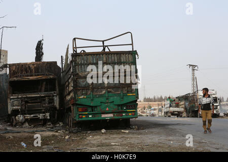 September 21, 2016 - Urum Al-Kubra, West of Aleppo, Syria - A convoy carrying humanitarian relief and directed to Aleppo under siege has been hit While the opposition blames the strike on the Syrian government and Russian forces, both Russia and the Syrian regime have denied any involvement. Credit:  Juma Muhammad/ImagesLive/ZUMA Wire/Alamy Live News Stock Photo
