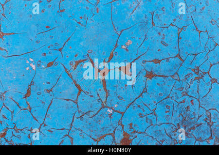 Rusty Colored Metal with cracked paint, grunge background, Blue Stock Photo