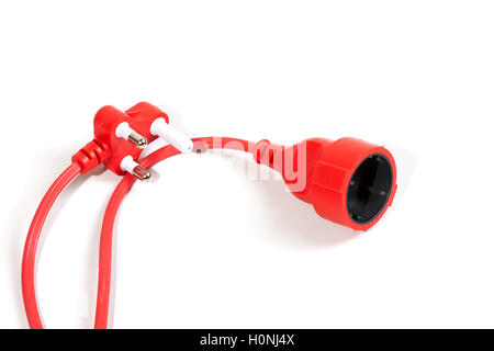 Studio shot close up of red male and female plug and socket of electric extension cable on white background Stock Photo