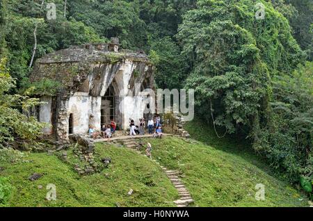 Tourists at Templo de la Cruz Foliada, Mayan ruins of Palenque, Chiapas, Mexico Stock Photo