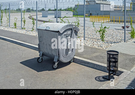 Item garbage collection and waste near the protected industrial zone Stock Photo