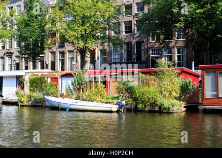 General view of houseboats alongside the canal in Amsterdam Stock Photo