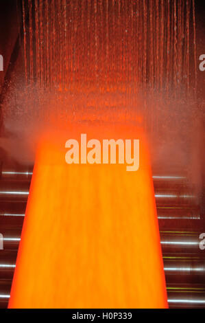 Cooling hot steel plate on conveyor Stock Photo