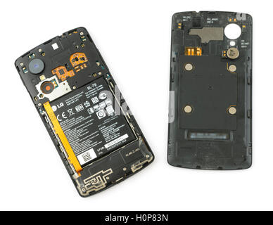 Lithium-ion battery on a smartphone with the back cover taken off Stock Photo