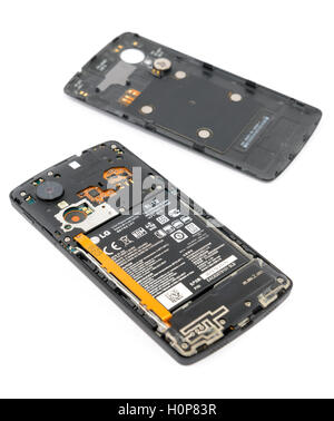 Lithium-ion battery on a smartphone with the back cover taken off Stock Photo