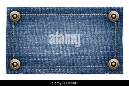 Worn blue jeans tag texture. Isolated denim label with rivets. Stock Photo