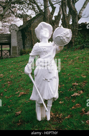 The figurehead of the Caledonia marks the grave of the ship's crew, Morwenstow churchyard. Cornwall, South West England, UK Stock Photo