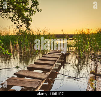 Sunset over the river. Amazing landscape. Stock Photo