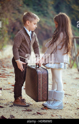 Girl and boy in the park. Stock Photo