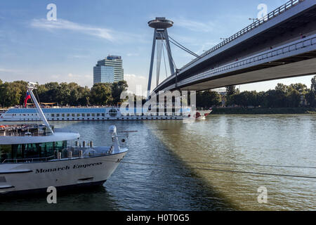 Bridge of the Slovak National Uprising (SNP) with UFO restaurant, boats, Danube, Bratislava, Slovakia, Europe Stock Photo