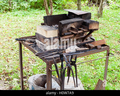 forge of country outdoor blacksmith on backyard Stock Photo