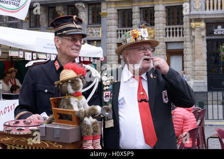 Order of Brussels Moustache participates in activities on Grand Place during Folklorissimo 2016 Folkloric Festival in Brussels, Stock Photo