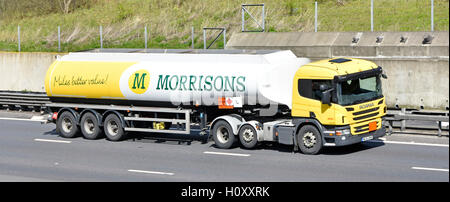 Transportation logistics Morrisons supermarket fuel delivery hgv articulated tanker lorry driving along English UK motorway Stock Photo