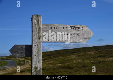 Wooden Signpost for the Pennine Way Long Distance Footpath near the Tan Hill in the Yorkshire Dales National Park, England, UK. Stock Photo