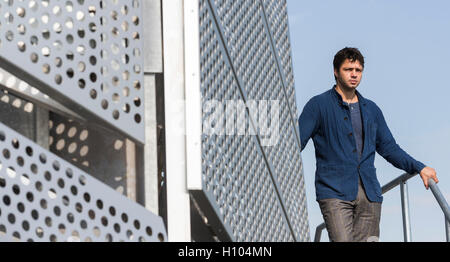 London, UK. 21 September 2016. British artist Conrad Shawcross (pictured) has been commissioned by Knight Dragon to create a major new architectural intervention for Greenwich Peninsula. The Optic Cloak launces on 21 September 2016 as part of the Peninsula's new low carbon Energy Centre, and has been designed in collaboration with the architectural practice C.F. Moller Architects. The Energy Centre will be completed in autum 2016 and will provide heat energy to 15,000 new homes and businesses. The structure is 49 metres high by 20 metres wide and 3 metres deep and has been constructed from alu Stock Photo