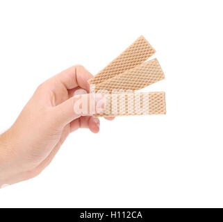 Hand holds wafer of chocolate. Stock Photo