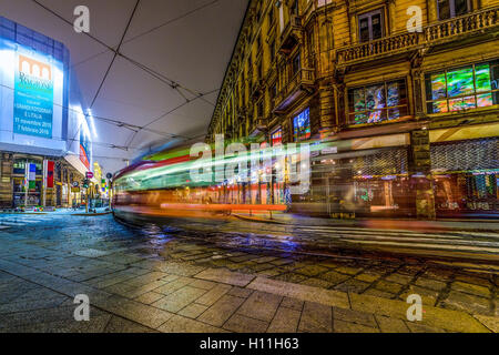 Tram car in Milan by night Stock Photo
