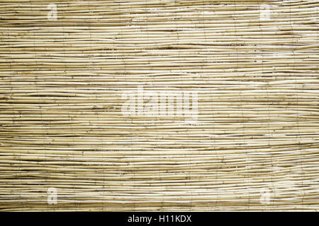 Covering bamboo wood house construction Stock Photo