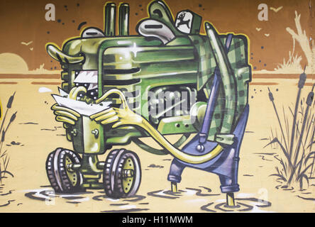 Graffiti agricultural machinery, nature and agriculture Stock Photo