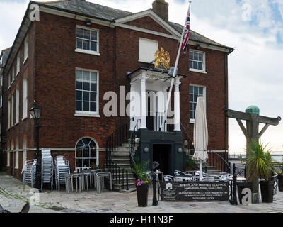 Red brick Georgian Building Custom House restaurant Poole Quay Dorset in the old part of this historic popular seaside town Grade 11 listed Stock Photo