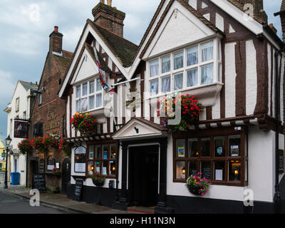 Historic half timbered building King Charles Pub dates from 1770 Poole Dorset England UK with colourful flower baskets in this popular seaside town Stock Photo